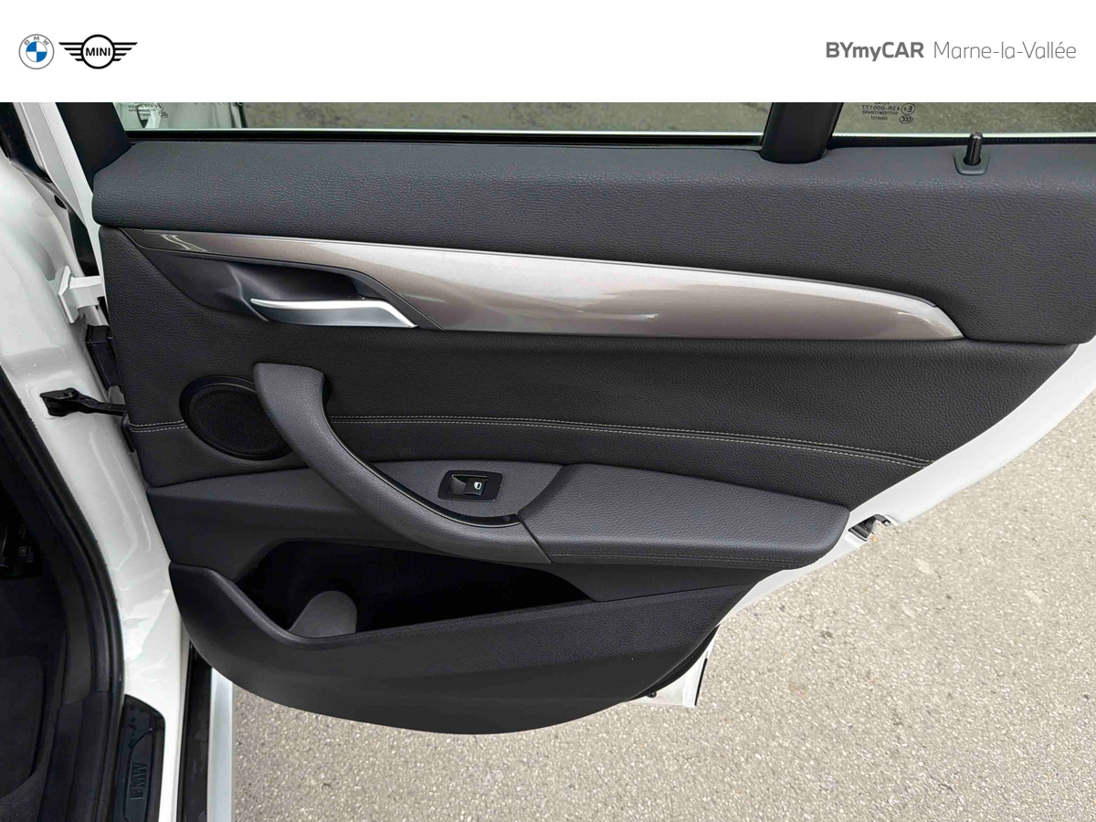 BMW X1 sDrive 18i 140 ch DKG7 — photo 27