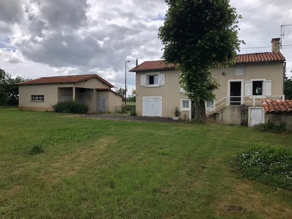 Maison avec 2 chambres et garage indépendant