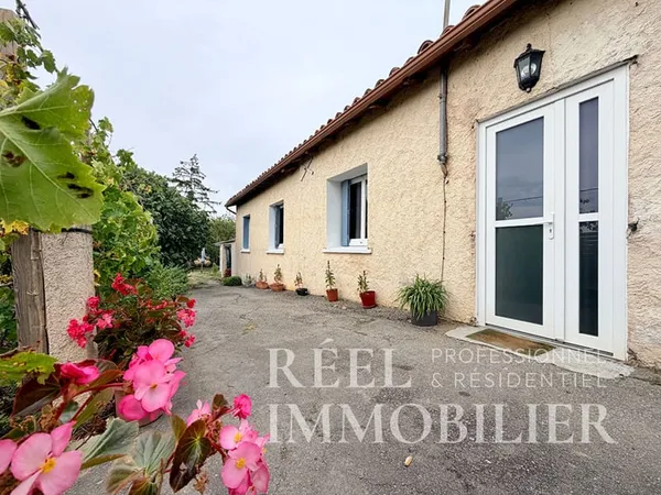 Maison de 80m2 avec grand terrain et 2 garages