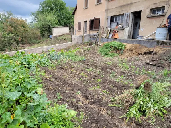 MAISON DE MINEUR AVEC TERRAIN