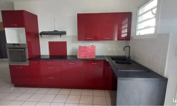 Appartement F4 - 71 m² avec jardin et terrasse couverte