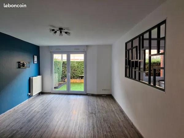 Appartement T2 de 50 m² avec jardin, garage et cave
