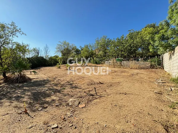 CANOHES Parcelle constructible viabilisée de 675m² - proche centre ville