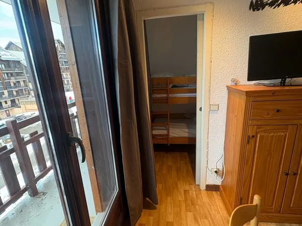 Studio dans immeuble en front de neige