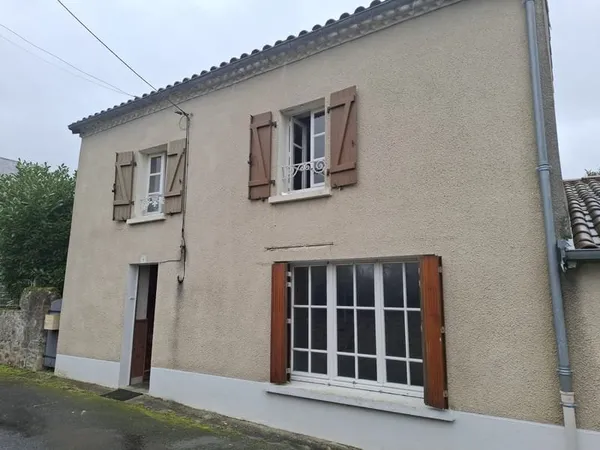 MAISON AVEC GARAGE ET TERRAIN