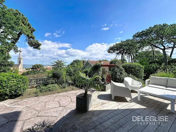 Appartement T4 de caractère avec vue Bassin et jardin en Ville