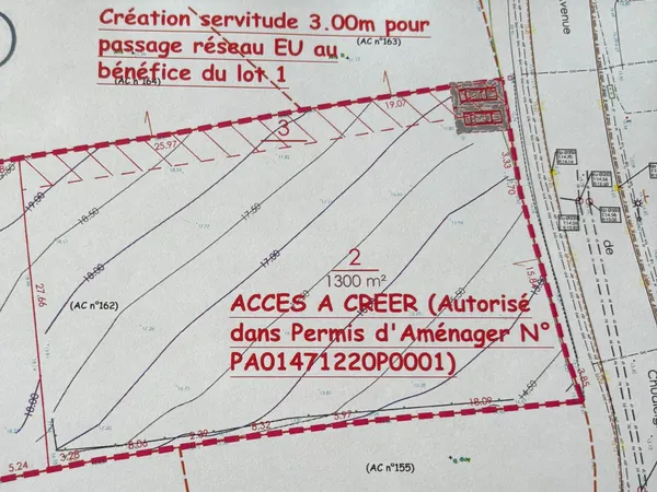 Terrain viabilisé de 1300 m². Libre constructeur.
