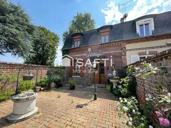 Charmante maison au pied des commerces
