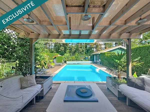 Maison avec piscine, sauna et terrain arboré