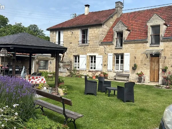 Maison 11 pièces 216 m²