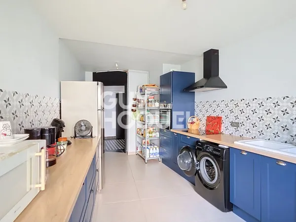 Appartement à vendre de 5 pièces de 104.7 m² avec jardin et garage