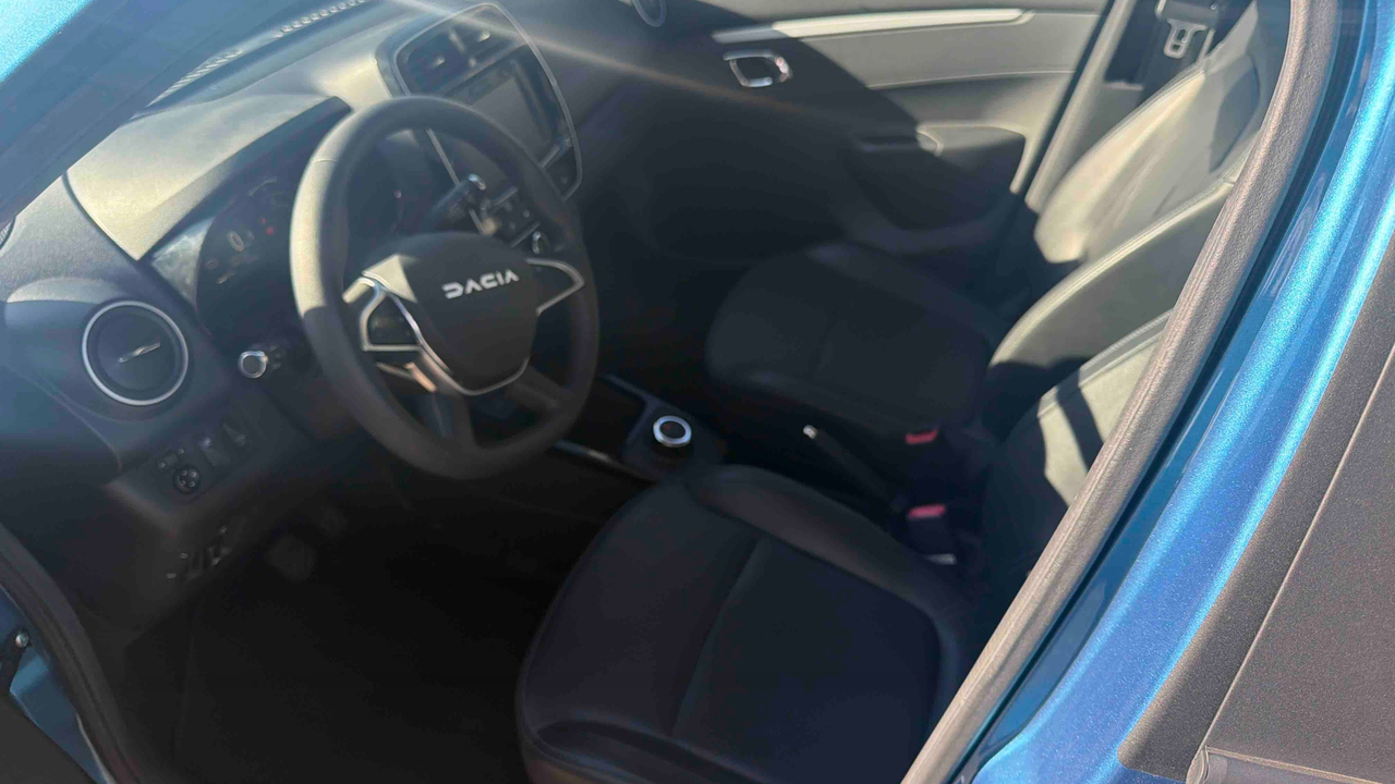 Dacia Spring — photo 11