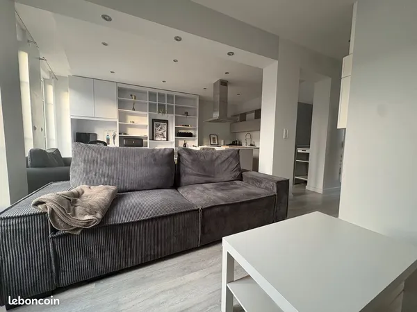 Appartement rénové vendu loué avec garage - proche du centre ville