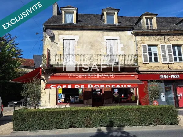 Immeuble de rapport comportant un local commercial et appartement T4