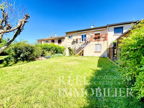Maison mitoyenne à Leguevin avec jardin, 4 chambres et un garage
