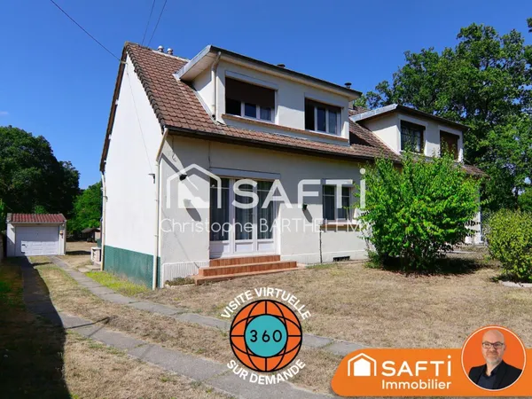 Maison mitoyenne 72m2 2 chambres sur sous-sol et grand jardin donnant sur le lac