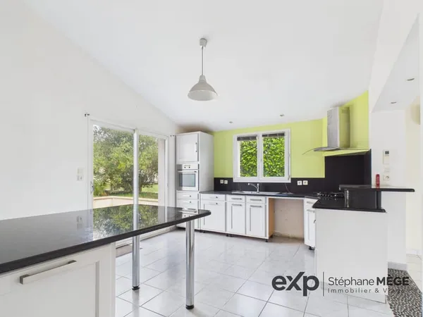 Maison de plain-pied 100 m² - 3 chambres - Jardin 487 m² ?