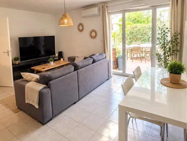 T4 85m2 Rdc jardin privatif 2 parking sous sol