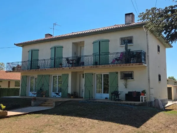 Maison 2 appartements+ garages