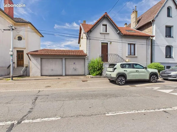 Maison individuelle - 121 m² - 3 chambres - Jardin - Caves - Garages