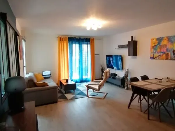 F2 50 m² - Rez-de-jardin avec terrasse & jardin - 2 parkings