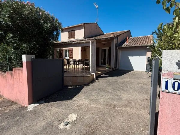 Maison avec jardin, garage et terrasse