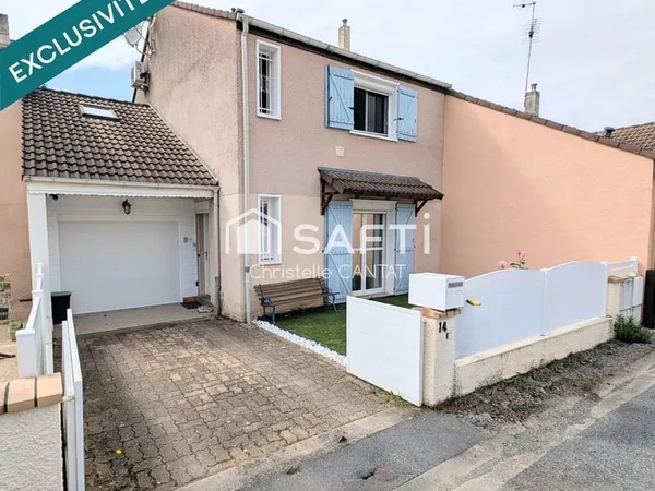 Maison 3 chambres, terrain et garage.