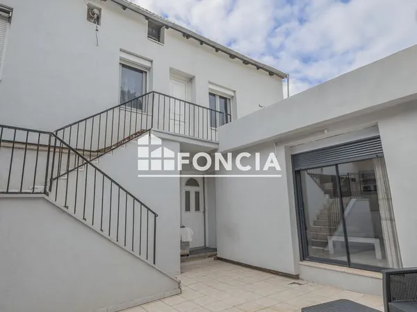 Maison de ville avec cour privative de 100 m²