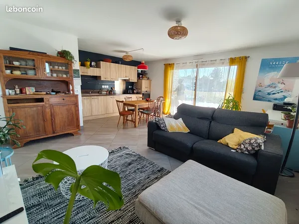 Appartement T3 de 68 m² avec terrasse, jardin privatif de 130 m², garage et cave
