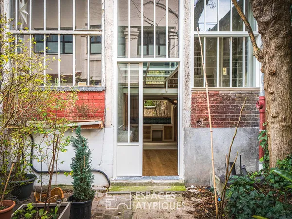 Atelier d'artiste rénové avec terrasse tolérée