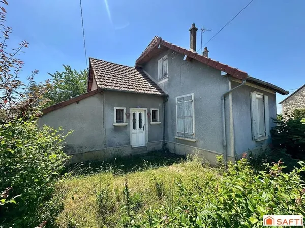 Maison mitoyenne avec 2 chambres, à rénover