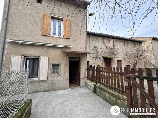 Ensemble immobilier composé de deux maisons mitoyennes