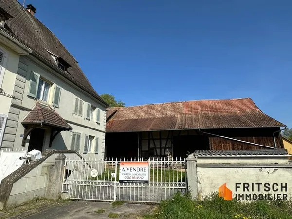 Maison mitoyenne de 141m² avec grange sur 25,63ares