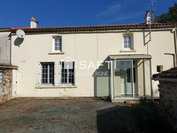 Maison de village avec beau potentiel