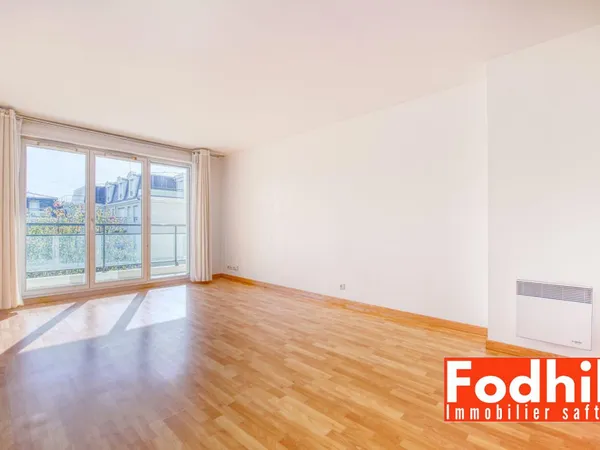 Appartement 3 pièces de 63 m²- au 2éme étage avec ascenseur- Balcon- Box et cave.