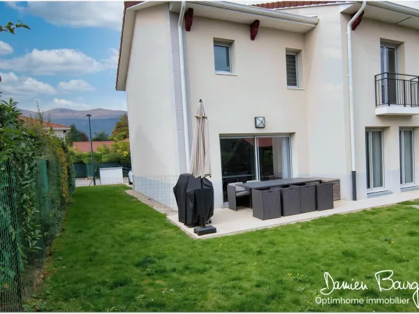 Maison mitoyenne de 126 m2 habitables avec double garage