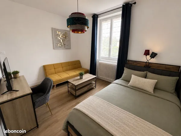 Grande chambre avec espace salon privé
