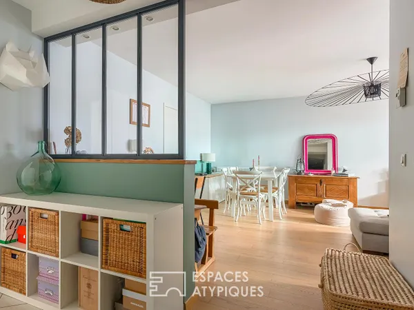 Appartement contemporain rénové avec verrière et balcon