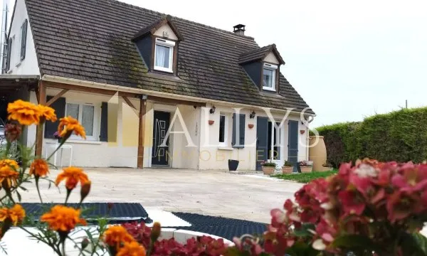 Maison 7 pièces avec véranda