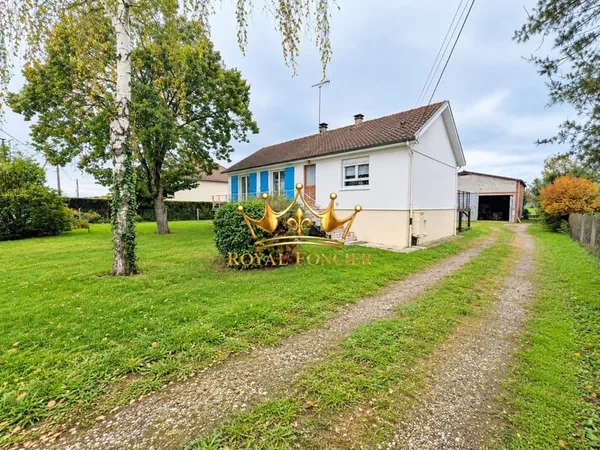 Pavillon sur sous-sol avec hangar