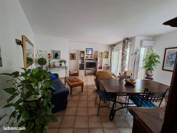 Appartement 3 pièces - 70 m² - 2 chambres - Balcons - Garage - Cave