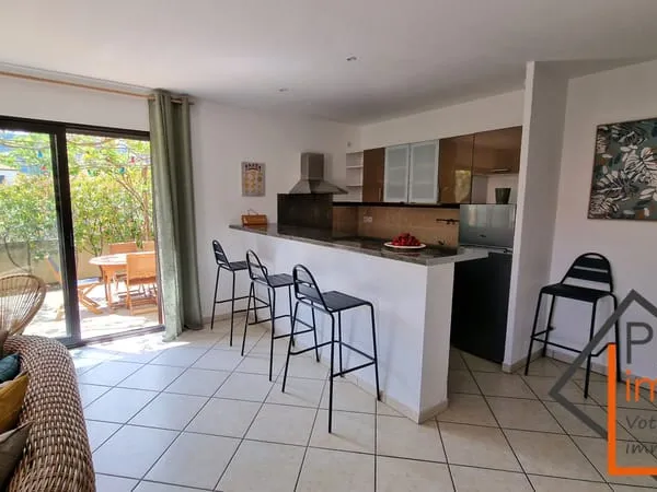 Maison 3 faces de 85 m2 avec garage et jardin