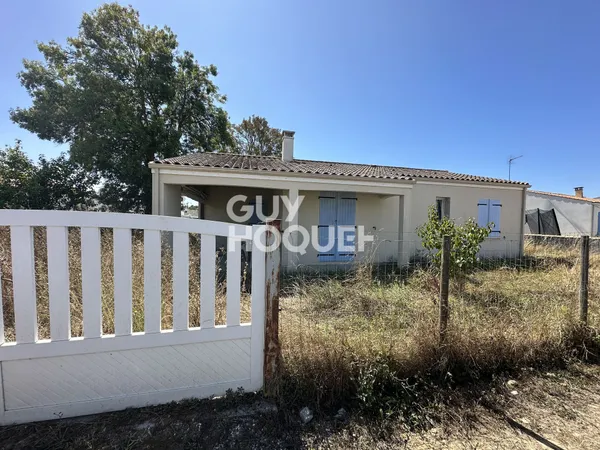 Maison à vendre avec garage.