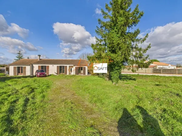 OPPORTUNITÉ À SAISIR : PLAIN-PIED, DOUBLE GARAGE + TERRAIN CONSTRUCTIBLE