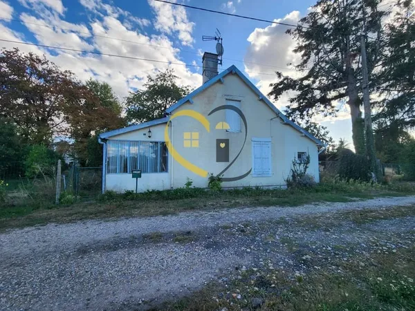 Maison à rénover avec grange et dépendances sur 1 000 m² de terrain