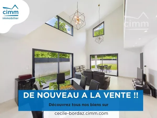 Maison mitoyenne par le garage