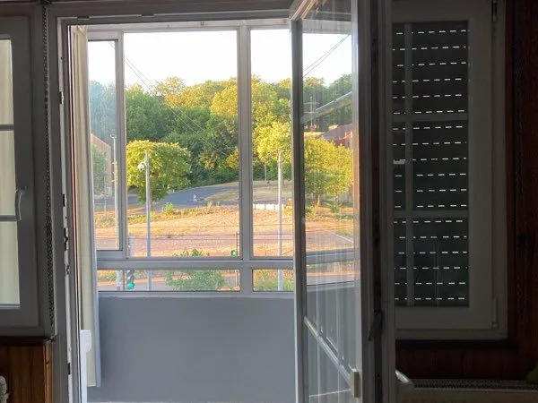 Appartement rdc dans maison individuelle avec jardin arboré