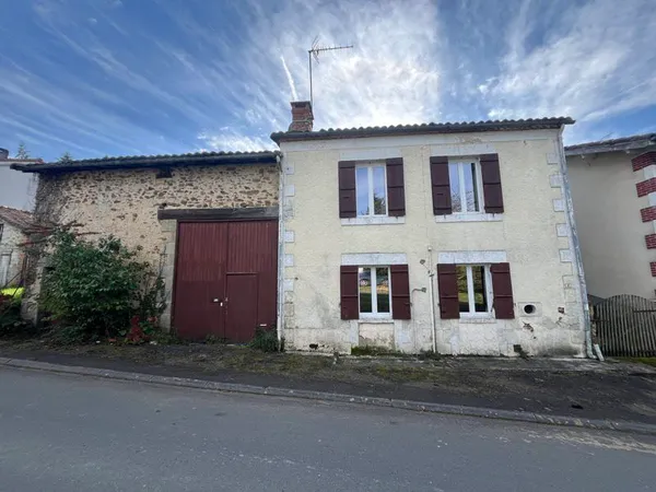 Maison de bourg de 6 pièces principales