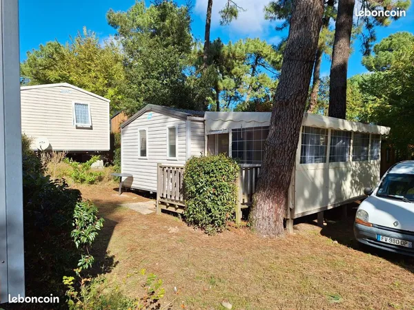 Vente mobil home avec terrasse fermée camping 4 * Grand village Plage