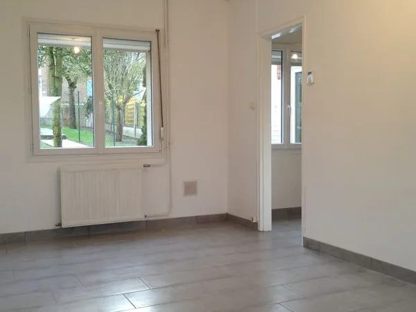 Maison 4 chambres 75 m² avec jardin et garage - Le Cateau